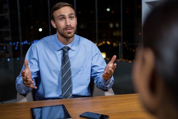 Businessman having a discussion in office