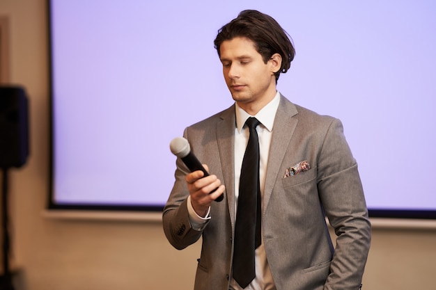 Businessman having speech during conference