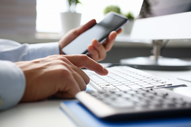 Businessman hipster holds telephone background