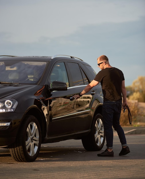 Businessman and his black car