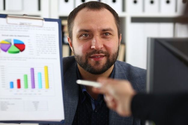 Photo businessman hold binder in his arms discuss with his partner their future project