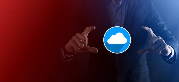 Businessman hold cloud icon.Cloud computing concept - connect smart phone to cloud. computing network information technologist with smart phone.Big data Concept.flat icons with long shadows