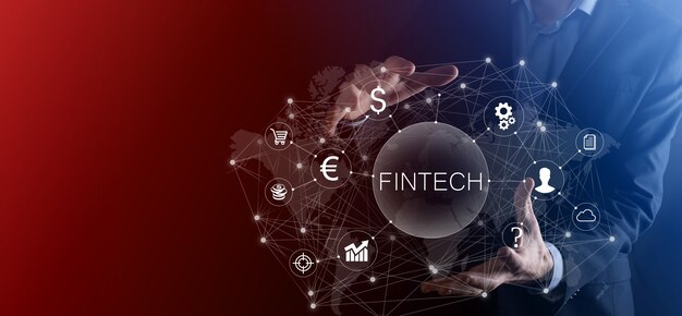 Бизнесмен удерживайте Fintech -financial технологий concept.Business инвестиционно-банковских платежей. Инвестиции в криптовалюту и цифровые деньги. Бизнес-концепция на виртуальном экране.