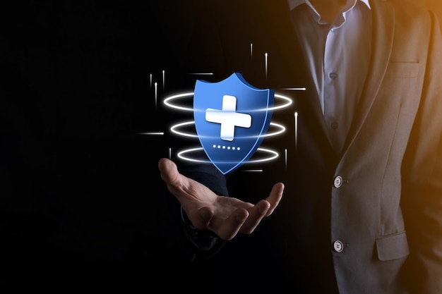 Businessman hold Shield with plus Low polygonal icon medicine iconHealth shieldMedical logo templateprotection symbol with cross sign healthcare security labelMedical logolife insurance service