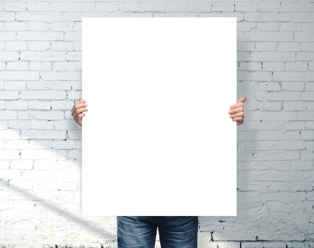 Businessman holding blank banner