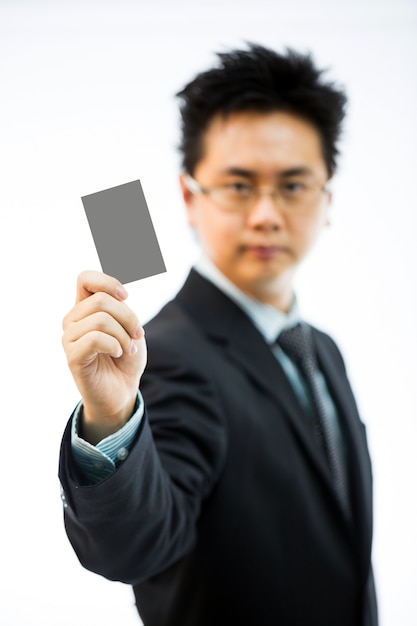 Businessman holding business name card