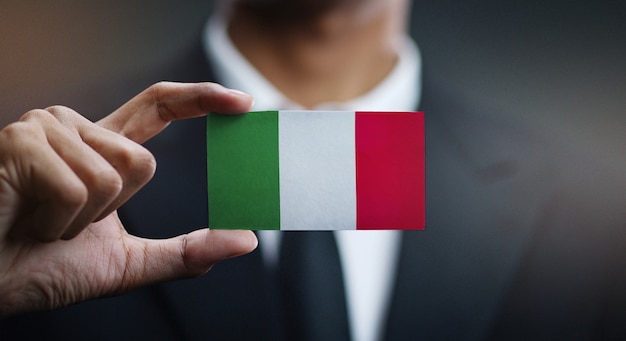 Businessman Holding Card of Italy Flag 