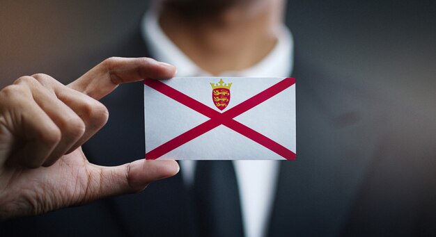 Businessman Holding Card of Jersey Flag