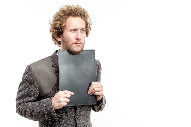 Businessman holding clipboard isolated on white wall