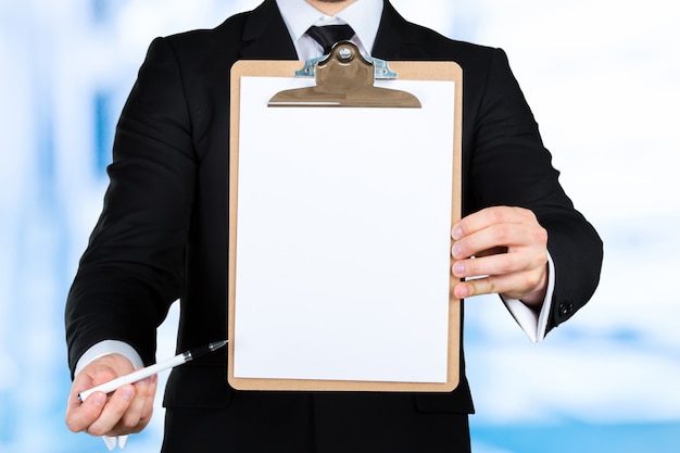 Businessman holding a clipboard