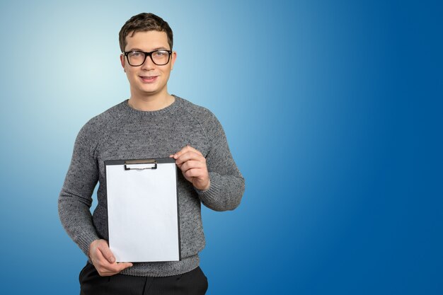 Businessman holding clipboard