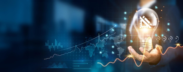 Businessman holding creative light bulb with growth graph and architectural icons