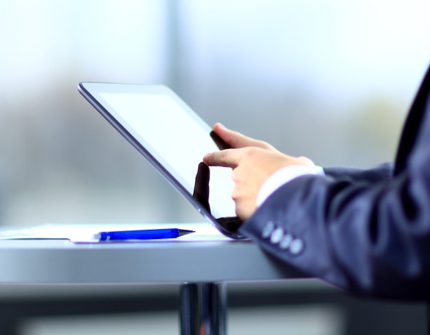 Businessman holding digital tablet