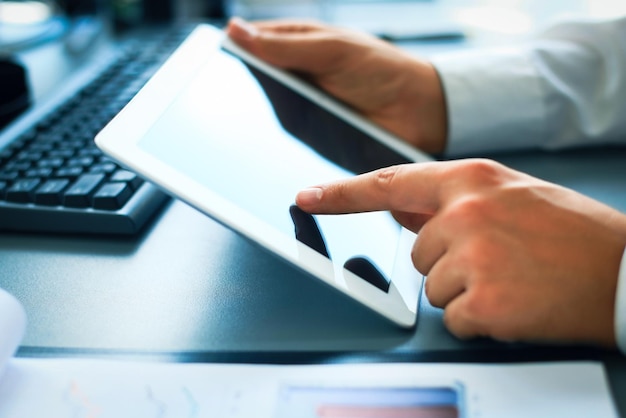 Businessman holding digital tablet