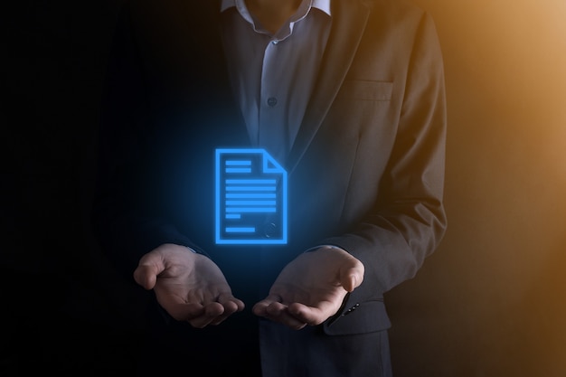 Businessman holding a document icon in his hand