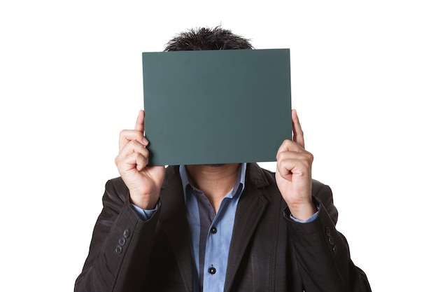 Businessman holding green blackboard isolated on white background
