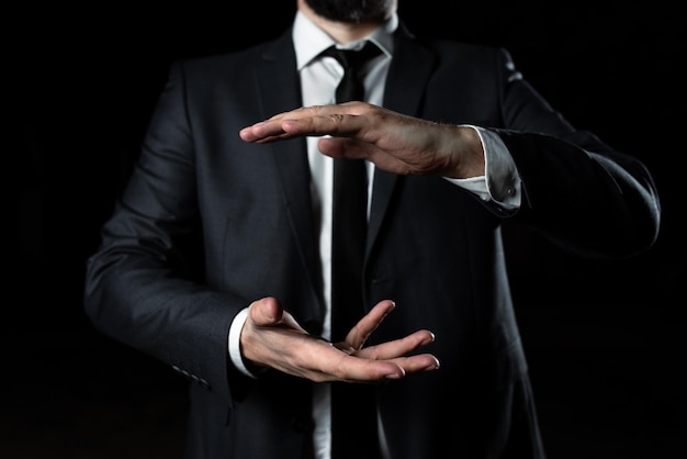 Businessman Holding Important Message Between Hands Man In Suit Showing New Crutial Idea Among Palms Executive Presenting Updated Critical Information