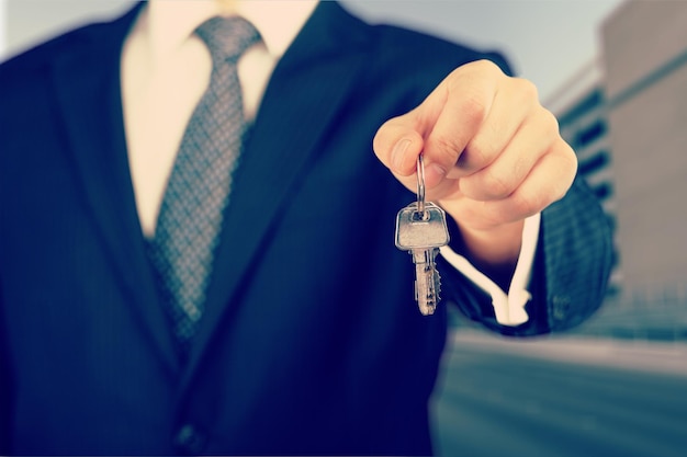 Businessman holding key