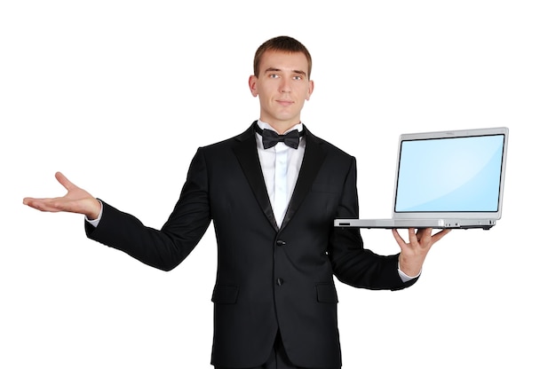 Businessman holding laptop