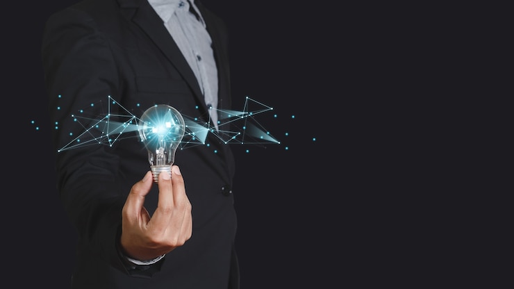 Photo businessman holding light bulbs. creative innovation technology. thinking creativity, power vision and ideas concept.