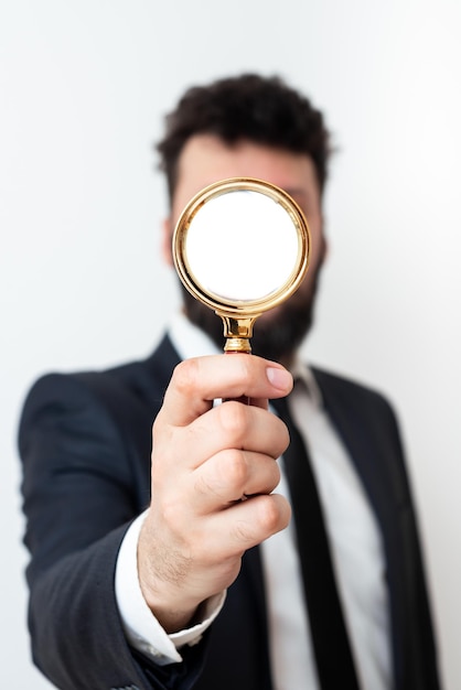 Businessman Holding Magnifier In One Hand Man Having Magnifying Glass To Point Important Information Gentleman Zooming Crutial Message Executive Presenting New Idea