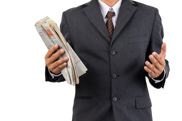 A businessman holding a newspaper