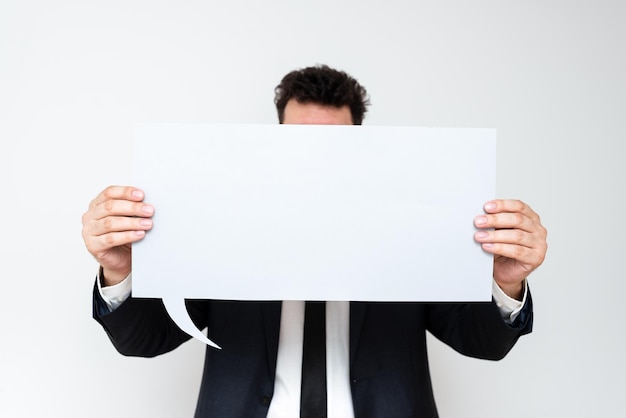 Businessman Holding Speech Bubble With Important Messages Man In Suit Presenting Crutial Informations On Dialogue Balloon Gentleman Showing Recent Updates On Paper