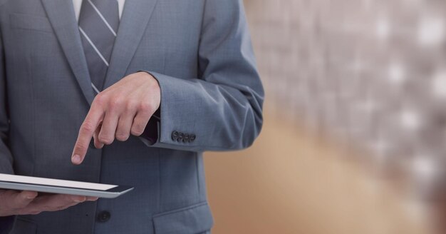 Businessman holding tablet