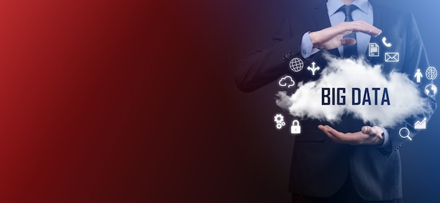 Businessman holds cloud with inscription, word big data.
padlock , brain ,man, planet,graph, magnifier, gears, cloud, grid,
document, letter, phone icon.