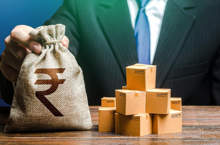 फोटो businessman holds indian rupee money bag and boxes with goods import and export business income