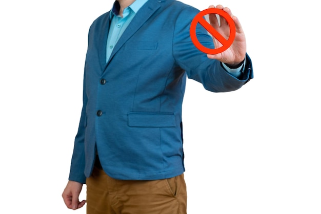 Businessman holds a red NO prohibition symbol