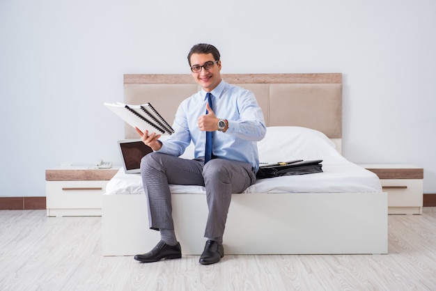 Businessman in the hotel room during travel