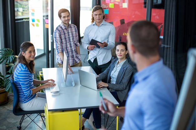 Businessman interacting with his colleagues