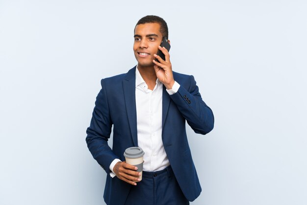 Businessman over isolated blue background