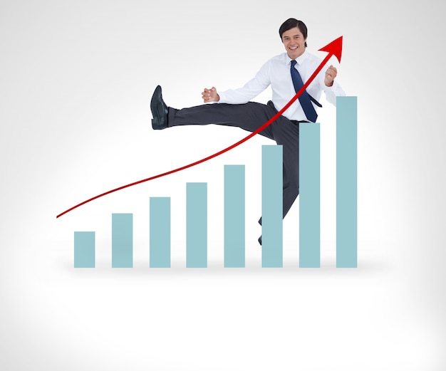 Photo businessman jumping over the graphical presentation