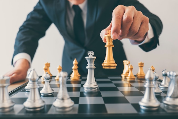 Businessman`s Hand Playing Chess Game To Development Analysis Ne Stock  Photo - Image of competition, business: 123928716