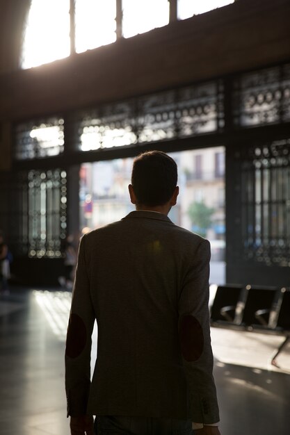 Businessman leaving the train station