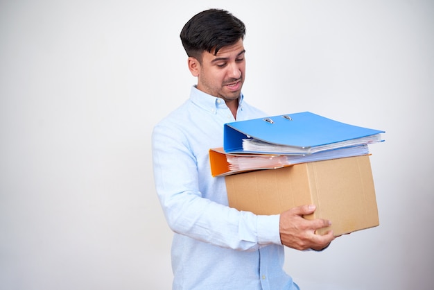 Businessman loaded with work