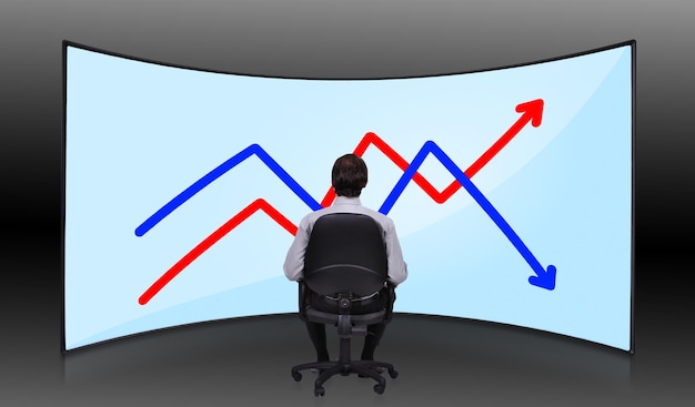 Businessman looking at chart