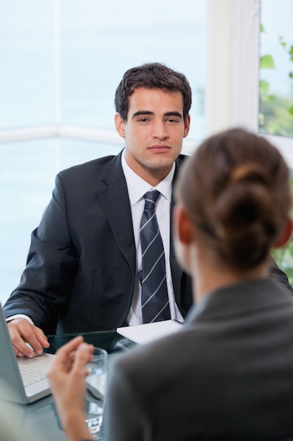 Businessman looking at his client