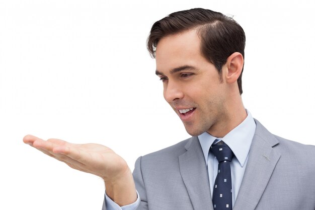 Businessman looking at his opened hand