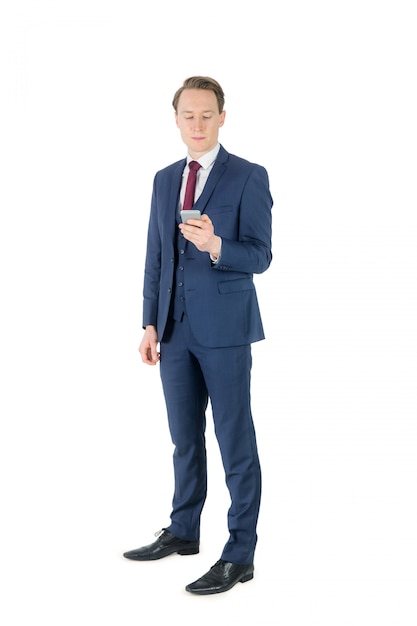 Businessman looking at his smartphone