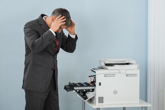 Office employee frustrated with printer error