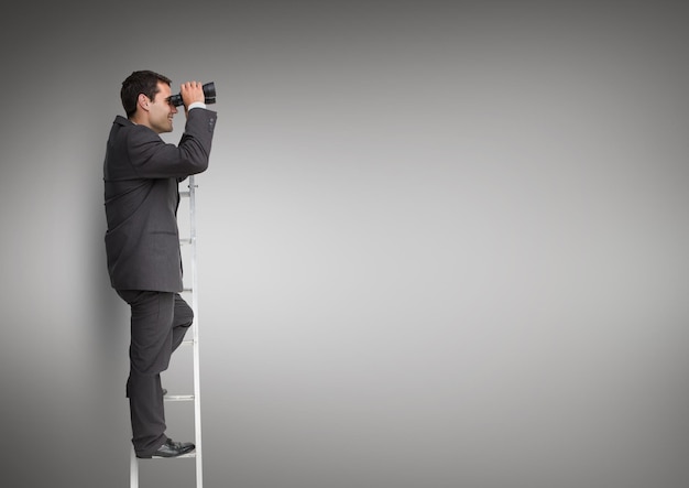 Photo businessman looking through binoculars while standing on the ladder