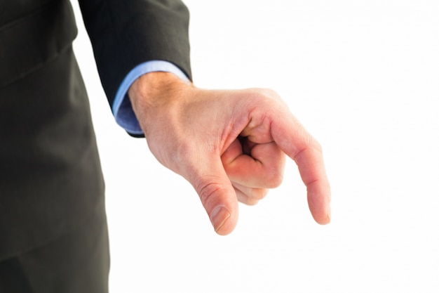 Businessman measuring something with these fingers