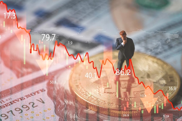 Businessman miniature figure standing on usd banknote with\
bitcoin and stock market graph chart for trader token money coin\
technology and investment growth planing strategy concept