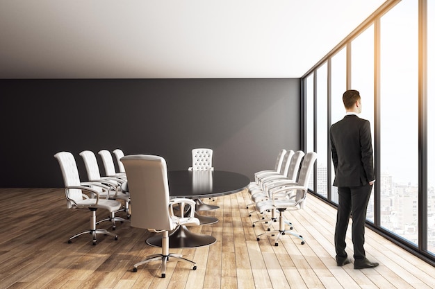Businessman in modern conference room