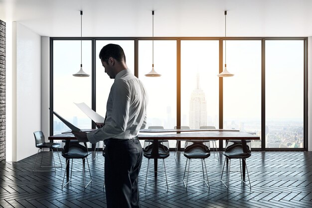 Businessman in modern meeting room