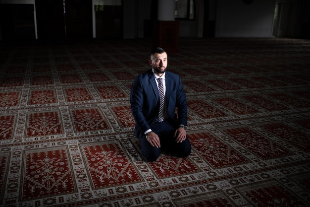 Businessman Muslim Praying in Mosque