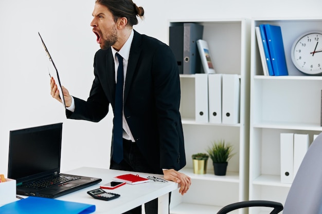 Businessman in the office with documents executive High quality photo